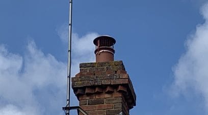 Chimney cowl fitted to stop birds going down the chimney
