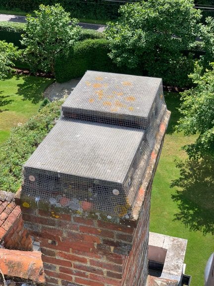 Top view of purpose made chimney guard to stop birds coming down the chimney