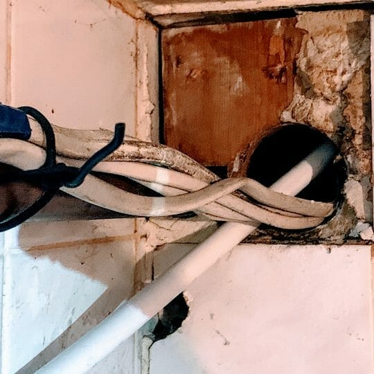 electrical cables from a home in maidstone with visible damage caused by rats gnawing